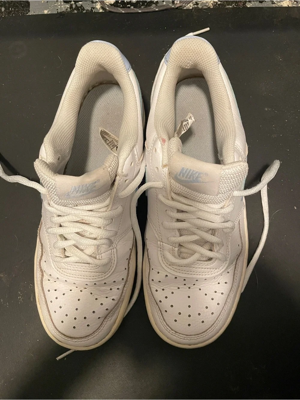 Nike White Low-Top Sneakers with Light Blue Swoosh